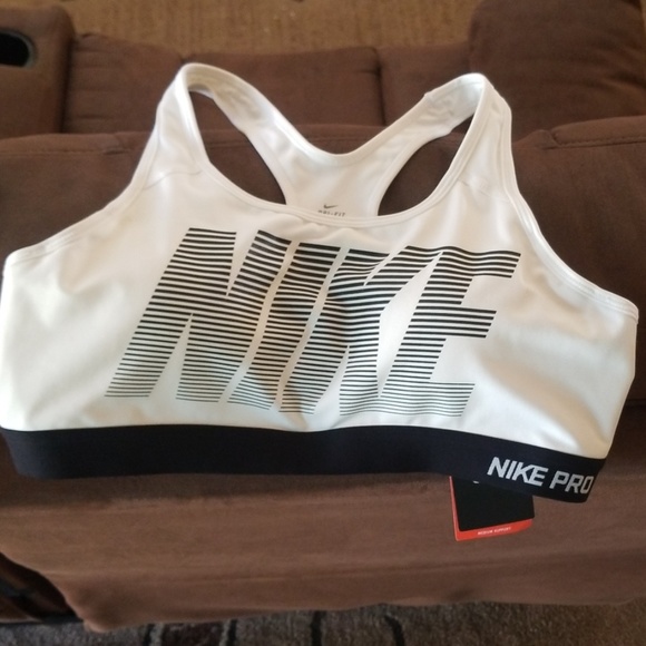 Nike Tops - SOLD Brand new Nike top. Never used.